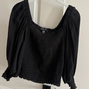 like new, puff sleeve black fitted blouse by the upscale brand FIFTEENTWENTY